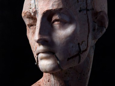 Christian Zucconi sculptures – Testa III (2014). Stone, iron and wax, cm 30 x 20,5 x 41