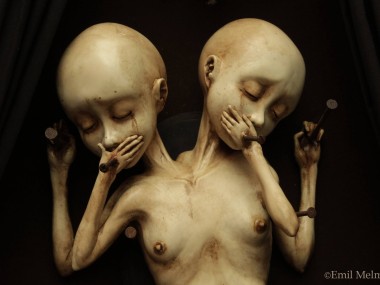 Emil Melmoth, Sculptures – A closer look of « Arcane », the twin sisters that are the main attraction of a wicked and morbid sight, the urging desire of the pedophile mind disguise as one of a gentleman